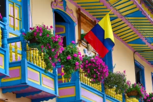 blooming flowers on colonial style balcony in Filandia Colombia