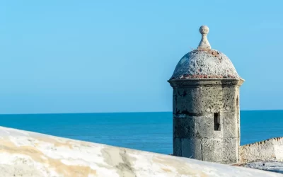 View of the defensive wall surrounding the old city of Cartagena, Colombia with the Caribbean Sea visible in the background